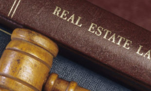 Real Estate Law Books and Gavel