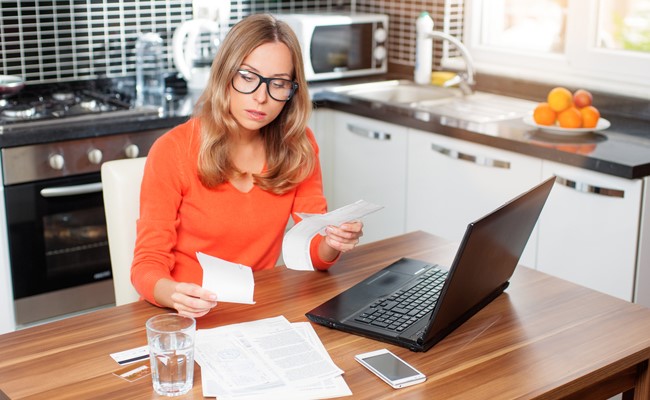 Woodlands TX Property Manager reconciling receipts