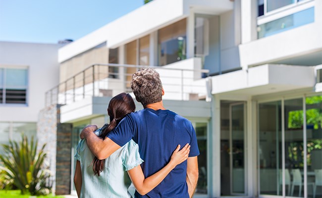 happy couple selling home in houston texas