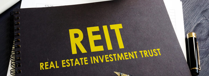 Real estate investment trust REIT on an office desk.