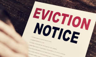 young man who has received an eviction notice