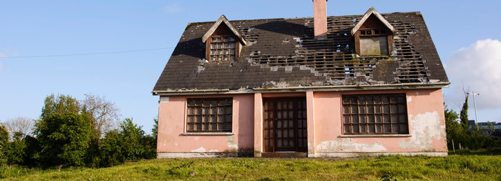 damaged house in need of repair