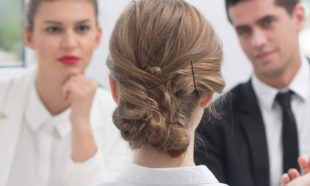Young woman and recruitment procedure in corporation