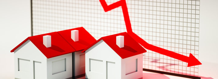 3d image of house with graph falling