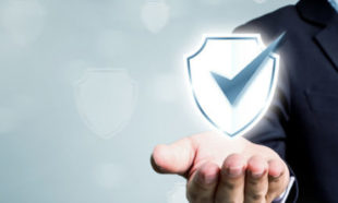 Businessman holding shield protect icon, Concept cyber security safe your data