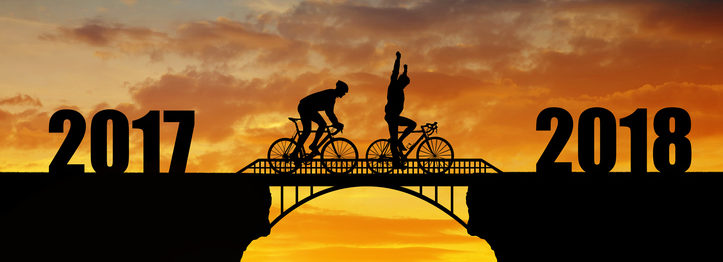 Cyclist riding across the bridge into the New Year 2018.