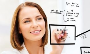 houston realtor mapping out the market on white board