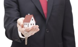 houston property manager handing over residential house keys