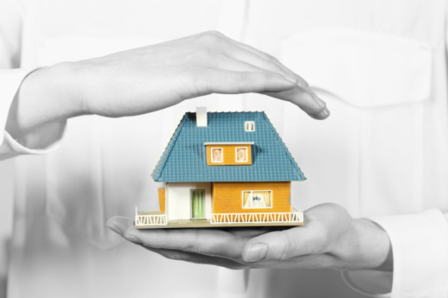 katy texas landlord with house in their hands