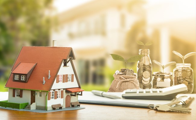 model of a a residential house sitting on desk