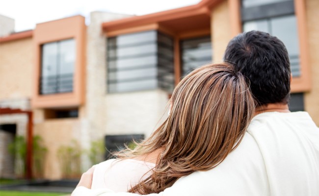 couple look at their new home they purchased in katy texas
