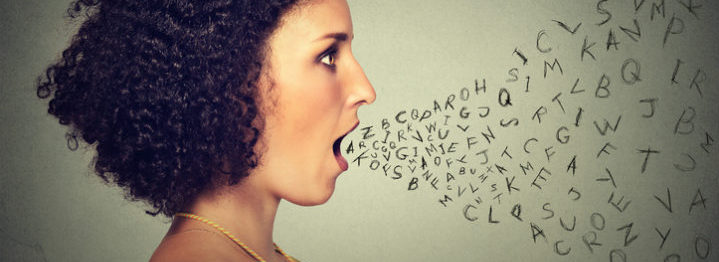 Woman talking with alphabet letters coming out of her mouth. Communication, information, intelligence concept
