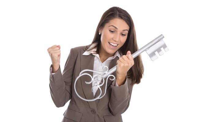 houston residential leasing agent holding home key